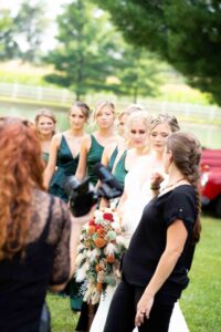 About Crystal Horton the photographer and her passion and creativity as she communicates with and guides Bride's Maids to make sure they are lined up for a fun photo opportunity.