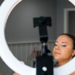 Bride with professionally applied makeup in soft natural lighting, showcasing smooth complexion and even skin tones.